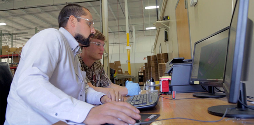 Aquest Machining computer team photo